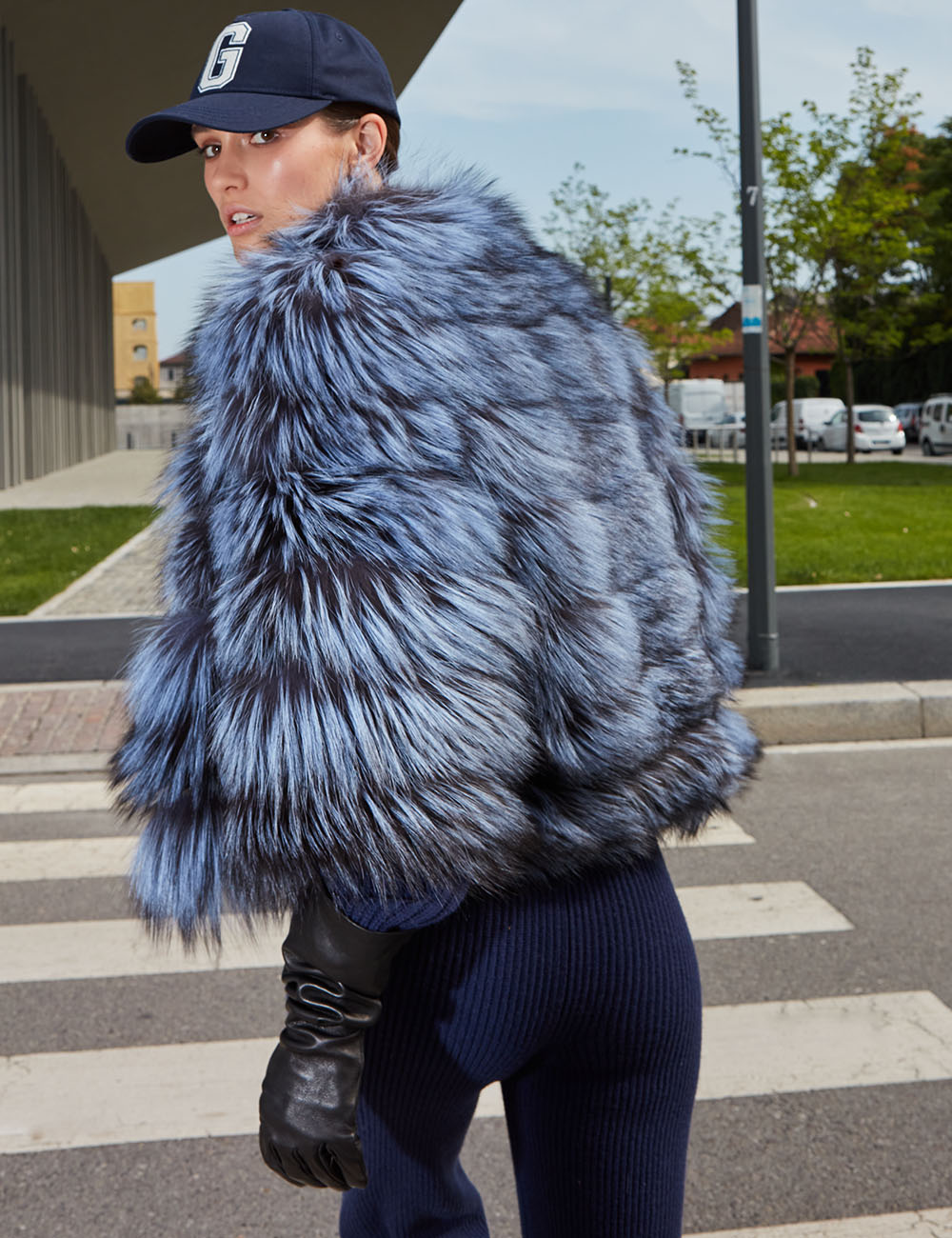 Short fox fur jacket in light blue color. Without collar.